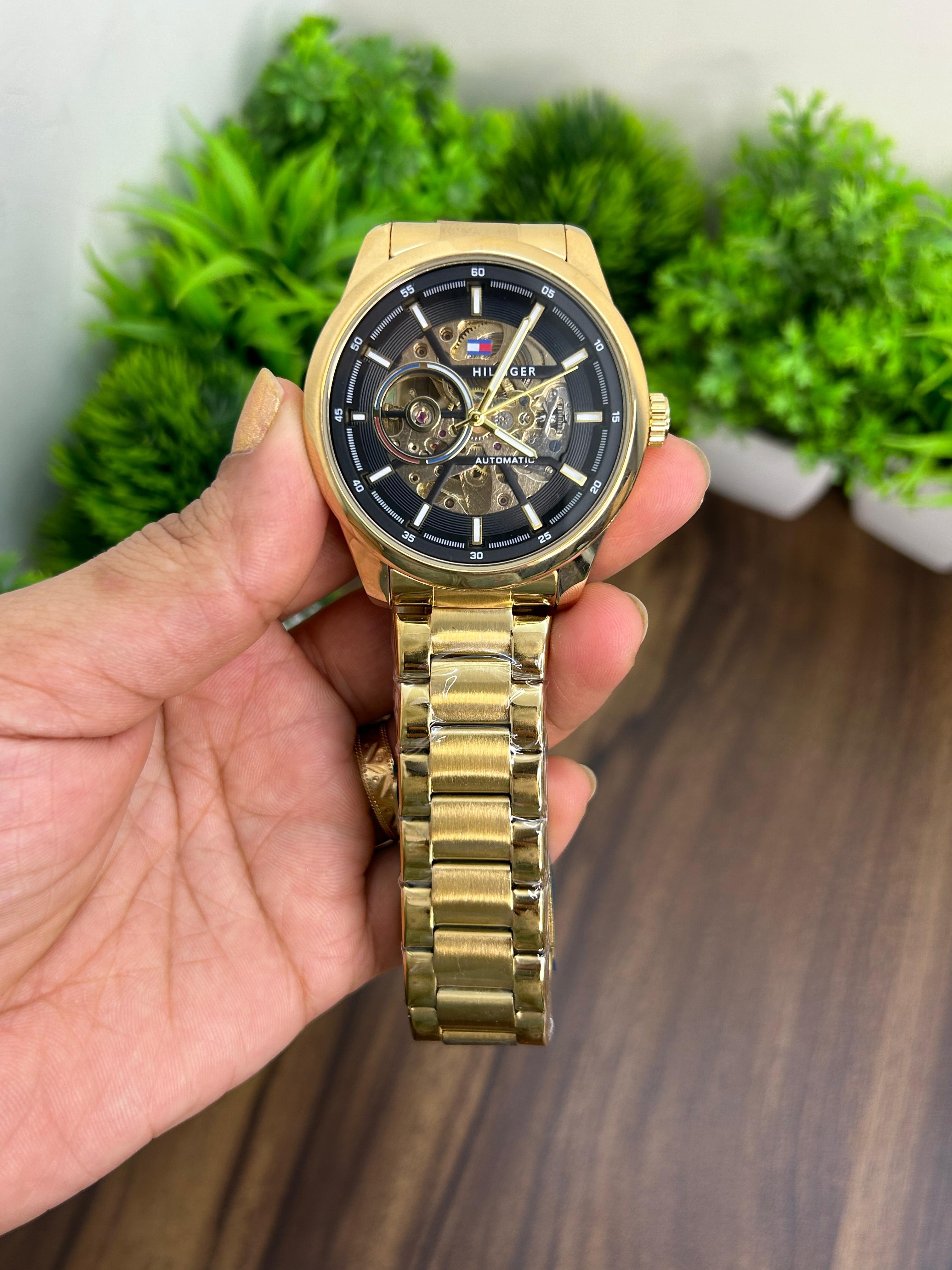 TOMMY FILFIGER AUTOMATIC GOLD BODY WITH BLACK DIAL
